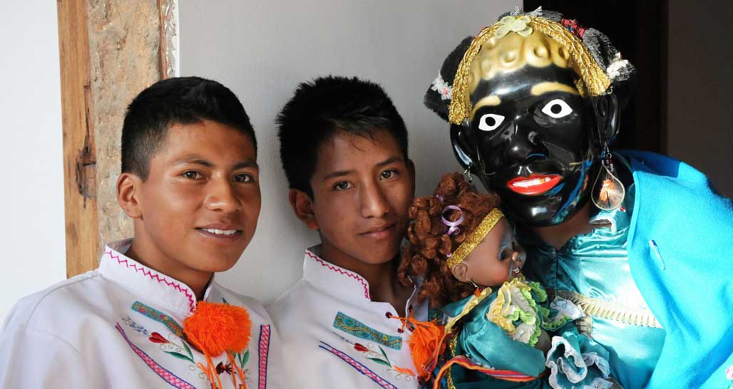 Ecuador: Indigenous traditional dancers near Lasso
