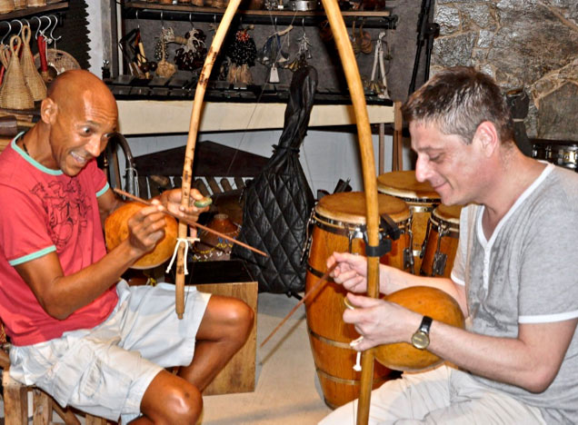 Miraviva enjoying Giba's demonstration of his percussion workshop
